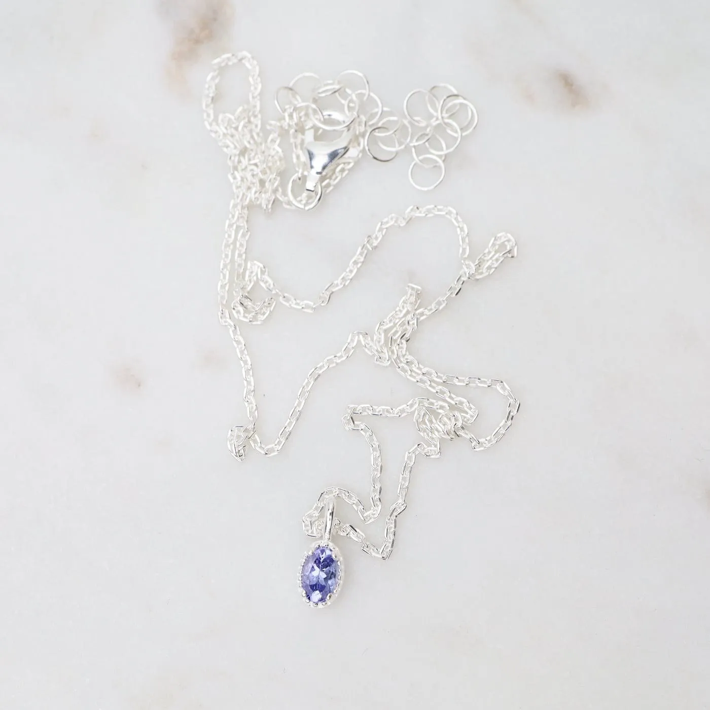 Oval Tanzanite with Milgrain Edge Necklace - Sterling Silver